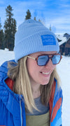 Girl with sunglasses on wearing the Buck Wild Beanie 