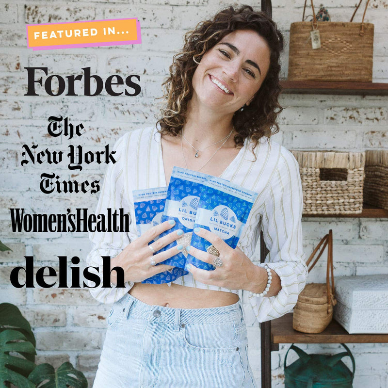 girl holding lil bucks with logos for Forbes, The New York Times, Women's Health and Delish