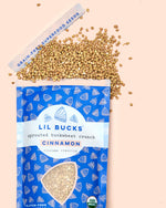 the superfood buckwheat seeds on the table from an open lil bucks bag